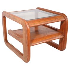 a wooden table with glass top on white background