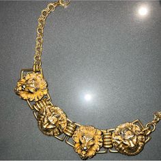 Gold Gucci Lion Choker. Very Rare. True Statement Piece. Never Worn More Than Three Times. Vintage Gucci Gold Jewelry, Vintage Gold Gucci Jewelry, Vintage Gucci Jewelry For Formal Occasions, Vintage Gucci Jewelry For Formal Events, Gucci Gold Chain Jewelry, Gucci Metal Chain Jewelry, Luxury Gucci Necklace For Formal Occasions, Gucci Gold Metal Jewelry, Gucci Formal Chain Necklace