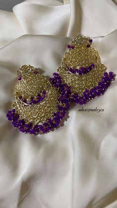 Purple Chand earrings, gold plated. No edits, only flash and without flash photography and videography.  Height || 80 mm Width || 72 mm Traditional Gold Beaded Earrings For Party, Purple Pierced Earrings For Wedding, Gold Plated Chandbali Chandelier Earrings For Party, Gold Jhumkas For Pierced Ears For Party, Purple Latkans Jewelry For Party, Gold Jhumkas For Party With Pierced Ears, Purple Dangle Earrings For Festive Occasion, Traditional Purple Earrings For Celebration, Festive Purple Dangle Earrings