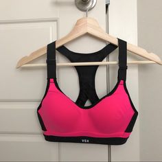 Color: Hello Lovely S45, With Mesh Vs Logo On The Back. Never Worn, I Wear Tank Tops Way More Than Sports Bra So Decide To Sell It. Pink Sports Bra With Stretch, Pink Fitted Workout Bra, Sporty Fitted Pink Bra, Pink Fitted Gym Bra, Pink Fitted Sporty Bra, Sporty Pink Bra, Victoria's Secret Camisole Top With Built-in Bra, Victoria's Secret Tops With Built-in Bra For Loungewear, Victoria's Secret Bra With Built-in Bra