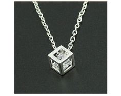 cubic zirconia rattling inside a cube pendant by Ringostone Modern Cubic Zirconia Necklace As Gift, Modern Cubic Zirconia Necklace For Gifts, Silver Solitaire Necklace With Square Pendant As Gift, Modern Diamond White Necklace Gift, Diamond White Rectangular Pendant Necklace As Gift, Diamond White Rectangular Pendant Necklace For Gift, Cubic Zirconia Necklace With Rectangular Pendant For Gift, Gift Cubic Zirconia Necklace With Rectangular Pendant, Diamond White Square Pendant Necklace As Gift