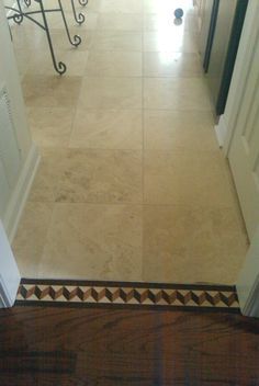 the floor is clean and ready to be used in this home's entryway