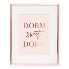 a pink and gold framed print with the words dorm sweet dorm in metallic foil on it