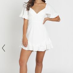 White Mini Dress, New With Tags, Never Worn. Size 10 Australian, Medium In Us Sizes. No Stains Or Flaws. Would Be Perfect For Graduation, Bridal Showers, Ect. - Made With 65% Cotton 35% Polyester & Love - Fully Lined 65% Cotton 35% Polyester - Care For Me; Line Dry In Shade Do Not Tumble Dry, Cold Iron - Length; 79cm/ 31.1in - Metal Invisible Zipper On The Center Back White Flirty Mini Dress, White Flutter Sleeve Mini Dress For Party, Fitted Flirty Mini Dress With Flutter Sleeves, Summer Off-white Mini Dress With V-neck, Off White V-neck Mini Dress For Summer, Fitted Flutter Sleeve Flirty Dress, Flirty Fitted Dress With Flutter Sleeves, Off White V-neck Summer Mini Dress, White Mini Dress For Brunch