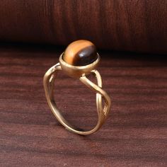 "Tiger Eye Ring, Handmade Ring, Brass Ring, Tiger's Eye Ring, Gift For Her, Anniversary Ring, Promise Ring, Dainty Ring, Ring For Women Size:- All Size Available In Variation Metal:- Brass Stone:- Tiger Eye IMPORTANT NOTE....👇 1 product free gift on purchase of 3 products. You can choose the free gift as your wish. Take a screenshot of the free gift you like from my shop and send me a photo in personal message. MUST READ....👇 5 stars is my shop's priority. So contact me before leaving any nega Handmade Brown Rings For Anniversary, Brown Handmade Rings For Anniversary, Handmade Oval Brown Rings, Adjustable Oval Rings In Brown, Oval Brass Promise Ring, Adjustable Oval Brown Rings, Handmade Brown Oval Ring, Handmade Brown Ring For Wedding, Unique Brown Oval Rings