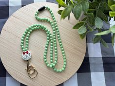 Beautiful handmade plastic beaded Christmas wreath lanyard. Includes a  gold keyring and lobster claw clasp, along with a plastic breakaway clasp. Beaded Christmas Wreath, Oct 30, Plastic Beads, Badge Holders Lanyard, Badge Holders, Christmas Wreath, Lobster Claw, Lanyard