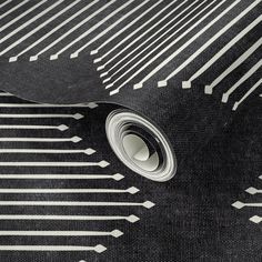 a black and white rug with lines on it