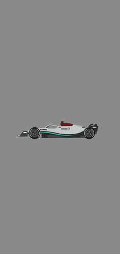 a white and green race car on a gray background