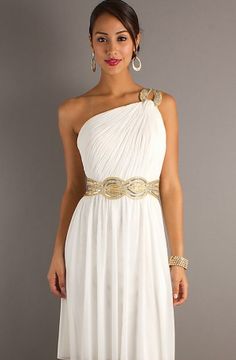 a woman wearing a white dress with gold accents on the waist and one shoulder, posing for