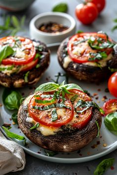 Stuffed portobello mushrooms with melted cheese, sliced tomatoes, and fresh basil on a plate. Caprese Portabella Mushroom Recipes, Stuffed Portabella Mushroom Recipes, Portabella Mushrooms Recipes, Spicy Garlic Shrimp, Stuffed Portobello Mushrooms, Portobello Mushroom Recipes, Stuffed Portobello, Garlic Parmesan Chicken Wings, Mushroom Recipe