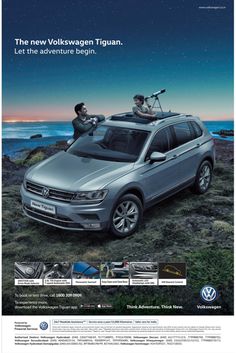 an advertisement for the volkswagen tiguan with two people sitting on top of it