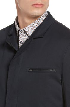 Made for the on-the-go guy, rain or shine, this smooth Italian cotton-twill jacket, designed like a blazer, has a water-resistant finish to protect from the unexpected. Innovative insulation warms the core without overheating. 31" length (size Medium) Hidden front-zip closure Notched lapels Long sleeves Chest zip pocket; button-flap welt pockets Interior drawstring Soft-touch taffeta lining 100% cotton Machine wash, dry flat Imported Men's Sportswear Winter Cotton Sport Coat With Notch Lapel, Business Cotton Outerwear With Patch Pockets, Modern Cotton Utility Jacket For Fall, Business Cotton Outerwear With Welt Pockets, Classic Blazer With Zipper Closure For Work, Business Cotton Sport Coat With Concealed Placket, Business Casual Cotton Outerwear With Notch Lapel, Cotton Notch Lapel Outerwear For Business Casual, Fitted Cotton Utility Jacket With Welt Pockets