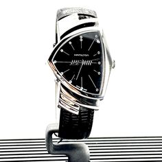 Hamilton Luxury Buisness Black Dial Leather Men's Watch - Band New With Tags! - Limited Quanity -100% Authentic - Full Retail Package With All Accesories About The Watch: Resistance: 50m Water-Resistance Size : 32.3mm X 50.3mm Glass: Mineral Glass Modern Diamond Watch With Subdials For Anniversary, Designer Black Diamond Watch With Diamond Hour Markers, Anniversary Leather Watch With Diamond Hour Markers, Black Business Watch With Stainless Steel Clasp, Modern Business Watches With Diamond Hour Markers, Designer Leather Watches For Anniversary, Luxury Business Diamond Watch With Analog Display, Luxury Business Diamond Watch Analog, Black Diamond Watch With Subdials For Business