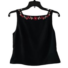 Beautiful Black Structured Sleeveless Top. Delicate, Yet Eye-Popping, Floral Embroidery Along The Square Front And Back Neckline Adds A Whimsical Detail To This Classic Little Black Top. I Purchased This Top As A Set To Wear With The Red Blazer And Skirt (And Soon-To-Be-Listed Red Pants) In My Closet. It's Versatile And Made Of High-Quality, Structured Material. Can Be Worn Casually For Work Or Dressed Up For A Cocktail Party, Wedding, Or Other Formal Occasions. Brand: Petite Sophisticate Color: Cocktail Party Wedding, Coral Flowers, Blazer And Skirt, Red Blazer, Red Pants, Red Coral, Embroidered Top, Square Necklines, Black Top