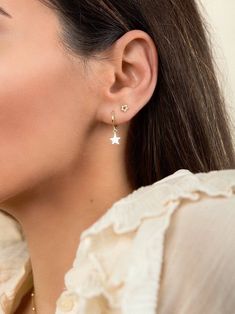 "An everyday go-to pair of huggie hoops. Simple, dainty and classy, these little star hoops are perfect for wearing stacked with other dainty hoops and studs. * Sold as a Pair * D E T A I L S * ∙ Material: .925 Sterling Silver or 18K Gold Plated over .925 Sterling Silver ∙ Dimensions: Hoop diameter: 11mm // Star charm: 8 mm ∙ Hypoallergenic & nickel-free * P A C K A G I N G * ∙ All jewelry is sent out beautifully packaged in our signature box & ready for gifting. ∙ In order to reduce was Trendy Gold Piercings In Sterling Silver, Minimalist 14k Gold Filled Piercings, Dainty White Gold Drop Cartilage Earrings, White Gold Dainty Drop Cartilage Earrings, Dainty White Gold Tarnish-resistant Cartilage Earrings, Dainty White Gold Tarnish Resistant Cartilage Earrings, Silver 14k Gold-filled Single Cartilage Earring, Small Silver 14k Gold Filled Earrings, Huggie Earrings Gold