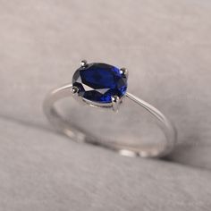 ◆ A oval cut fancy sapphire ring, handcrafted with 925 sterling sliver. It is suitable for engagement occasion/daily wear. ◆ Production Description: Main stone Type: Lab Grown Sapphire Main Stone Shape: Oval Cut Main Stone Size: 6*8mm Side Stone: NONE Metal: 925 Sterling silver - Other options available in the drop down menu ◆ Customization: √Free for Add Engraving √Other Metal Type Available √Other Gemstones & Shapes Available √Personalization Requests Available ◆ Packaging: To give you a c Oval Sapphire Promise Ring, Minimalist Oval Sapphire Ring, Minimalist Sapphire Oval Birthstone Ring, Minimalist Oval Sapphire Birthstone Ring, Oval Sapphire Solitaire Birthstone Ring, Oval Sapphire Solitaire Promise Ring, Elegant Oval Solitaire Sapphire Ring, Minimalist Oval Sapphire Anniversary Ring, Elegant Oval Sapphire Ring In Sterling Silver