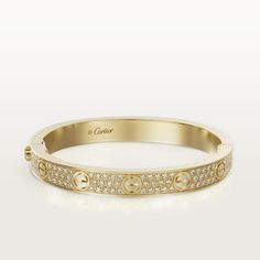 Cartier - LOVE bracelet, diamond-paved - Bracelet Gold/Diamond - LOVE bracelet, 18K yellow gold, set with 204 brilliant-cut diamonds totaling 2 carats. Width: 6.7mm. Cartier Love Bracelet Diamond, Cartier Diamond Bracelet, Cartier Gold, Pave Bracelet, Cartier Panthere, Bracelet Love, Bracelets Gold Diamond, Love Bracelet, Classy Jewelry