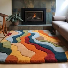 a living room with a fire place in the fireplace and rugs on the floor