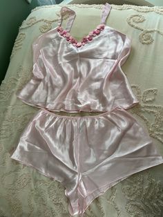 This is a gorgeous pink silky set of short pajamas! Perfect for sprimg! Perfect  if you love pretty girly things! Very soft feminine girlycore! I just adore the little rosettes on the top! Beautiful condition! Very coquette style! Size XL  100% polyester   I can't wait for someone to have this beauty! Feminine Pajamas, Spiderverse Dr, Victoria + Core, Pink Silk Pajamas, Romantic Coquette, Aesthetic Feminine, Pajamas Aesthetic, Pajamas Short, Feminine Casual