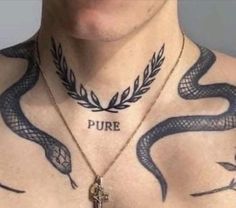 a man with a snake tattoo on his chest