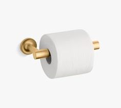 a white toilet paper holder with gold handles