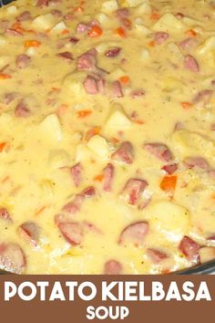 a casserole dish with potatoes, ham and carrots on it in a pan