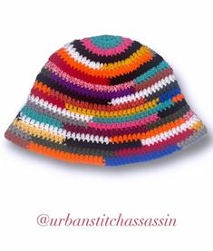 "Handmade with 100% Acrylic Yarn The Colorado \"Scrap\" Bucket Hat is a stylish and fun crochet 1 of 1 piece! Each hat is made differently and uniquely with a random array of colors and yarn. Each bucket hat is made with durable, hypoallergenic, and machine washable material.  These hats are an \"Adult Small\" and will fit head circumferences up to 22-23 in.  These items are pre-made and will be shipped 1-2 days after ordering.  Please feel free to send a message with any questions!  **Washing Instructions: Machine wash warm, gentle cycle. Tumble dry low. Do not iron. Do not bleach.**" Handmade Multicolor Snapback Hat, Multicolor Yarn Mini Hat With Curved Brim, Multicolor Brimmed Mini Hats In Yarn, Multicolor Crochet Bucket Hat With Short Brim, Adjustable Multicolor Crochet Hat With Short Brim, Handmade Multicolor Mini Beanie Hat, Handmade Multicolor Mini Beanie, Retro Multicolor Crochet Hat, Handmade Multicolor Mini Cap Hats