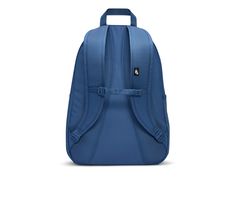 a blue backpack on a white background