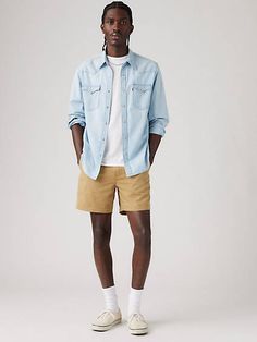 Our XX Chino Authentic Shorts are a symbol of summer sartorial tradition. Relaxed, ultra-versatile and supremely soft;these shorts live up to their name. And where comfort is concerned, these are it. A roomy, relaxed fit Two front pockets for a classic style Cut with a mid-length silhouette Features a hidden zip-secure pouch in the right pocket With a 6-inch inseam Tan Shorts Outfit Men, Chino Shorts Mens Outfit, Tan Shorts Outfit, Wfh Wardrobe, Mens Chino Shorts, Spring Shoot, Black Chino Shorts, Mens Shorts Outfits, British Khaki