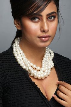 White layered twisted necklace with pearls. Type: Pearl Color: White Other Details:  12mm, 14mm and 16mm Manufactured Pearls Nickel free Lead free Light Weight Dimensions L x B (in inches): 20 x 7 Weight (in gms): 209 Closure: Lobster clasp Note: The stud earring worn by the model is not for sale  - Aza Fashions Pearl Color, Aza Fashion, Pearl White, Twist, Sparkle, Stud Earrings, Color