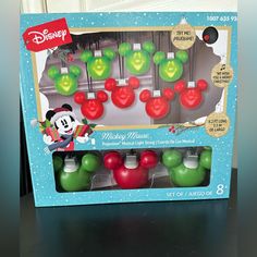 the mickey mouse christmas ornament set is in its box