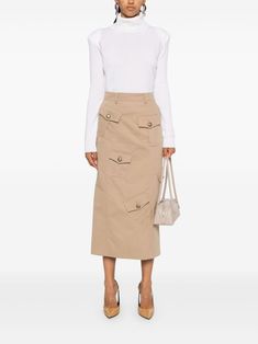 Find MOSCHINO Cargo Midi Skirt on Editorialist. beige cotton-wool blend twill weave concealed rear hook and zip fastening high-waisted belt loops two side slash pockets multiple cargo pockets martingale to the rear central rear vent straight hem mid-length Chic Fitted Beige Cargo Skirt, Beige Cargo Skirt For Spring Workwear, Elegant Beige Skirt With Belt Loops, Khaki Cargo Skirt For Workwear, Chic Beige Skirt With Belt Loops, Beige Cotton Skirt For Work, Cargo Midi Skirt, Twill Weave, Blazer Vest