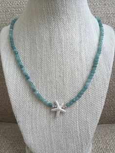 Studio G Wrap Starfish Necklace Style 511. Natural Stone. Wear as a necklace or wrap as a bracelet. On elastic. Cheap Silver Beaded Necklaces For Beach, Adjustable Blue Necklace With Starfish Charm, Blue Necklaces With Starfish Charm And Round Beads, Adjustable Ocean-inspired Necklace With Starfish Charm, Adjustable Necklace With Starfish Charm, Blue Starfish Charm Necklace, Ocean-inspired Starfish Charm Beaded Necklace, Adjustable Blue Beaded Star Necklaces, Adjustable Blue Star-shaped Beaded Necklace