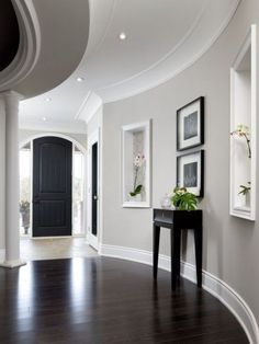 the hallway is clean and ready for us to use as an entrance way in this house