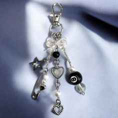 a key chain with charms attached to it