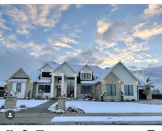 a large house with snow on the ground