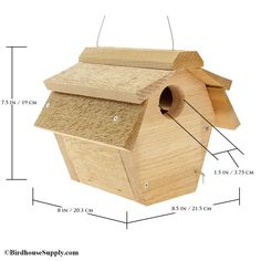 a wooden birdhouse with measurements for the top and bottom part on it's side