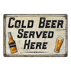 an old metal sign that says cold beer served here with two beers on the bottom