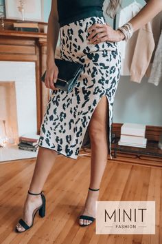 Elevate your fashion game with our Animal Print Knit Midi Skirt. Designed to fit true to size, it combines the allure of cheetah print with a comfortable knit base, an elastic waist, and a sultry side split. Dress it up for any occasion or lounge in comfort and style. Find the perfect harmony between fashion and ease! 🌟 #MidiSkirt #CheetahPrint #ComfortFashion Chic Stretch Pencil Skirt For Day Out, Chic Midi Pencil Skirt With Side Slits, Leopard Print Stretch Pencil Skirt, Elegant Leopard Print Summer Bottoms, Chic Leopard Print Skirt For Spring, Chic Leopard Print Midi Skirt, Leopard Print Pencil Skirt For Party, Fitted Elegant Leopard Print Bottoms, Elegant Fitted Leopard Print Bottoms