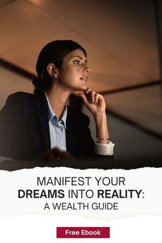 a woman sitting at a desk with her hand on her chin and the words manfest your dreams into reality