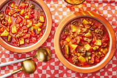 two bowls of chili and tofu soup on a checkered tablecloth