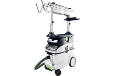 a white and green cleaning machine on wheels