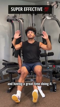 a man sitting on top of a bench in front of a gym machine with the words super effective and having a great time doing it