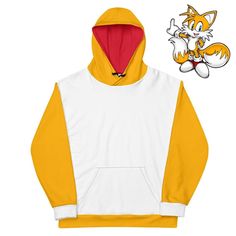 Soar into adventure with this unisex hoodie inspired by Tails! The soft exterior showcases a whimsical print, while the brushed fleece interior ensures comfort. With a relaxed fit, it's perfect for embracing Tails's charm and companionship on any day. Elevate your style and let the two-tailed fox be your wingman in fashion and fun! NOTE: Due to the customized nature of our products, we do not accept returns for incorrect sizing. Please carefully consult our sizing chart before completing your pu Hooded Fleece Sweatshirt With Character Print, Fleece Hooded Sweatshirt With Character Print, White Hooded Sweatshirt With Character Print, Sporty Hooded Hoodie With Character Print, Sporty Cartoon Print Hooded Hoodie, Sporty Hooded Hoodie With Cartoon Print, Tails Miles Prower, Miles Prower, Themed Outfits