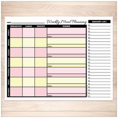 a printable weekly planner on a wooden surface with the words, daily meal planning