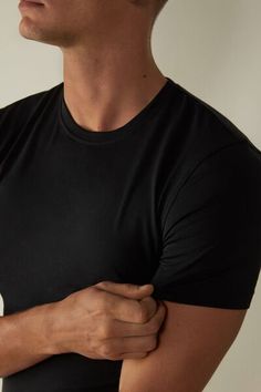 Short sleeve crewneck T-shirt in stretch Supima® cotton. The fiber of the highest quality, incredibly soft and breathable, it features optimal elasticity. The structure of the fabric guarantees excellent durability from washing. A simple and comfortable piece. Seamless Crew Neck T-shirt For Loungewear, Casual Black Seamless T-shirt, Solid Color Scoop Neck T-shirt With Minimal Stretch, Seamless Stretch Crew Neck T-shirt, Seamless Crew Neck T-shirt With Comfort Fit, Stretch T-shirt For Layering, Stretch Soft Touch Tops For Everyday, Everyday Stretch Tops With Soft Touch, Everyday Solid Seamless T-shirt