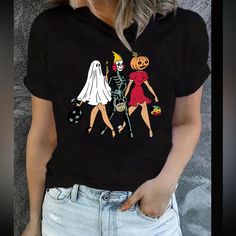 Get Ready For Halloween With This Spooky And Stylish T-Shirt! Featuring A Pinup Design With Ghoulish Characters Like Ghosts, Skeletons, And Pumpkins, This Shirt Is Perfect For Any Halloween Lover. Made With High-Quality Materials, This Shirt Is Sure To Last And Keep You Looking Great All Season Long. Available In A Women's Size Medium, This Shirt Is Perfect For Anyone Who Loves Halloween And Wants To Show Off Their Spooky Side. With Its Black Color And Halloween Theme, This Shirt Is A Must-Have Black Grunge T-shirt For Fall, Trendy Black T-shirt For Fall, Halloween Black T-shirt With Character Print, Trendy Skull Print Tops For Fall, Spooky Black T-shirt For Fall, Spooky Black T-shirt With Skull Print, Black Crew Neck Top For Halloween, Edgy Short Sleeve Halloween Tops, Casual Black Halloween Top