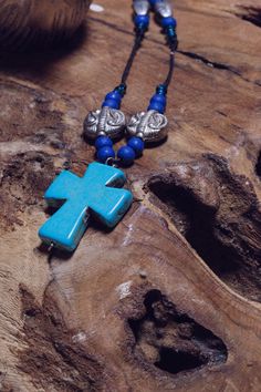 "This Cross of aqua represents the sense of calmness and tranquility that comes from faith.  Paired with silver, which is connected with the moon and female energy, makes this the perfect combination.  37\" total length and will slip over head. I trust the next chapter because I know the author." Trust The Next Chapter, Black Cross Necklace, Lava Stone Necklace, Sea Opal, Female Energy, Rhinestone Cross, I Trust, Protection Necklace, Blue Evil Eye