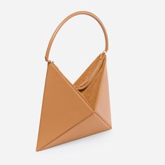 An iconic piece that will transform your everyday outfit. The Flex Hobo is designed with a modern geometric aesthetic and architectural feel. It is an incredibly roomy bag with plenty of space inside for all of your essentials, including mobile phone, tablet, big wallet and even 500 ml water bottle! Crafted from Italian cow leather, and has a suede top, two-way zip fastening. Interior features two slip pockets that can be used for concealing valuable items such as keys or cash. Hand-crafted from Suede Tops, Secret Sale, New Launch, Cow Leather, Everyday Outfits, Product Launch, Wallet, Leather