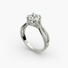 a white gold engagement ring with diamonds on it